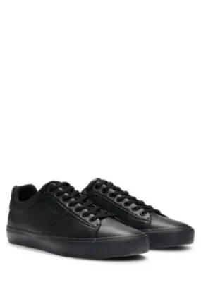 Faux-leather trainers with plain and grained textures