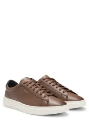 Lace-up trainers in polished leather with logo details