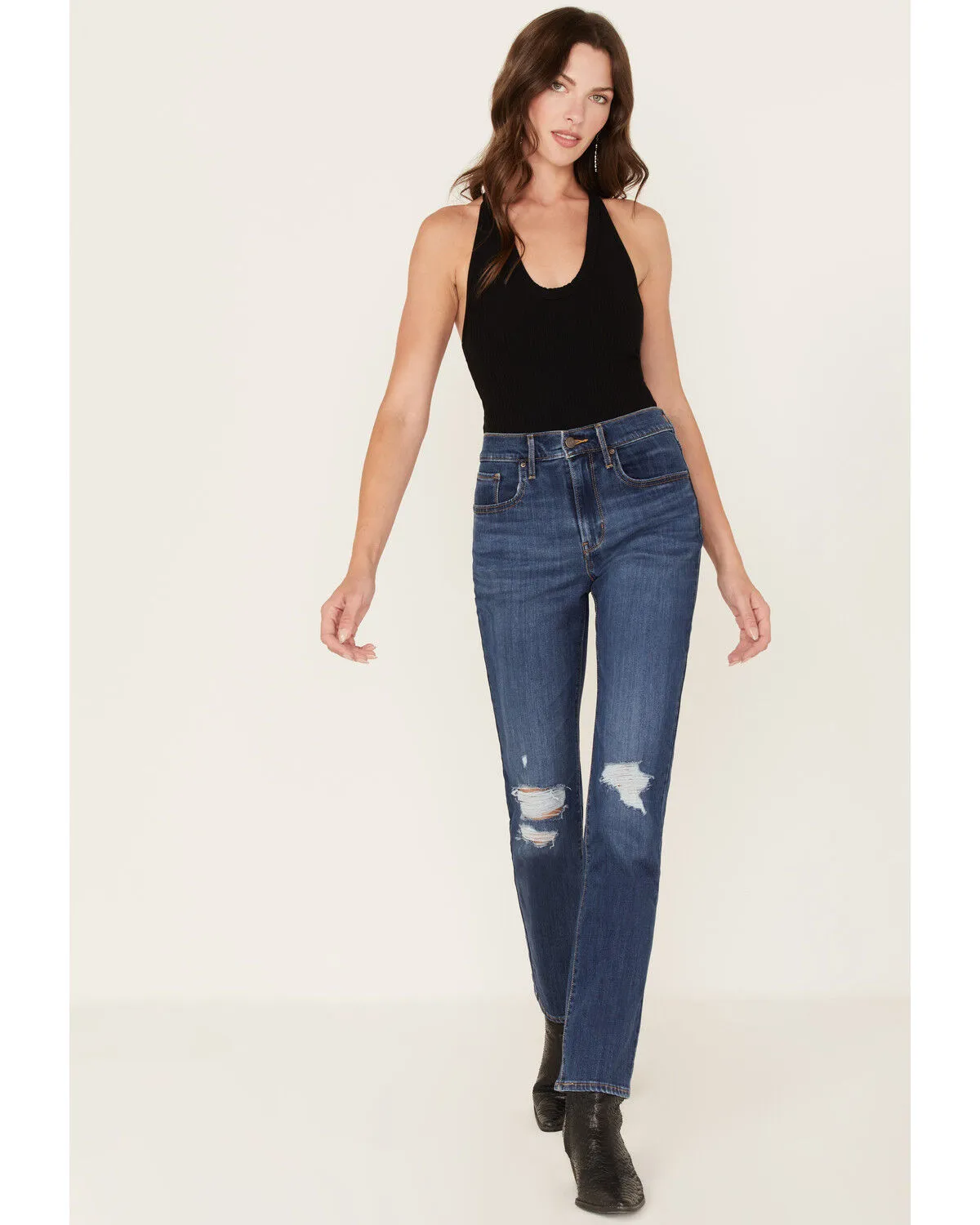 Product Name:  Levi's Women's 724 Dark Wash High Rise Distressed Straight Jeans